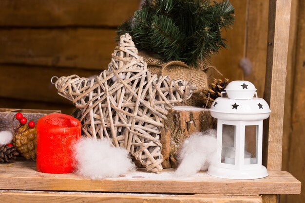 Close up Simple Christmas Ornaments, Emphasizing Wooden Star on Wooden Table