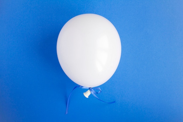 Close up on single white balloon