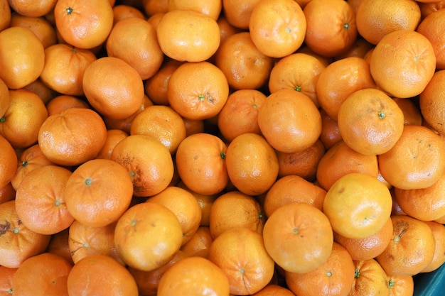 Close up of slice of orange fruits in a bowl