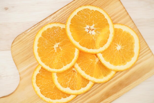 Close-up of sliced oranges on table