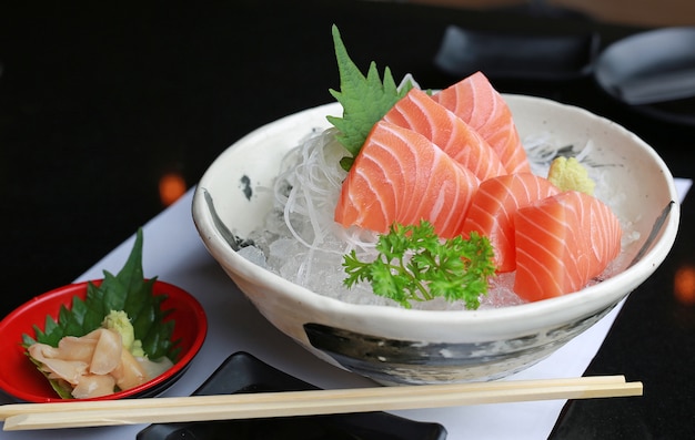 Close-up Sliced salmon raw sashimi on ice