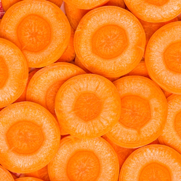 Photo close-up slices of carrot