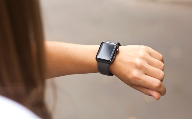 Close up on smart watch on woman hand