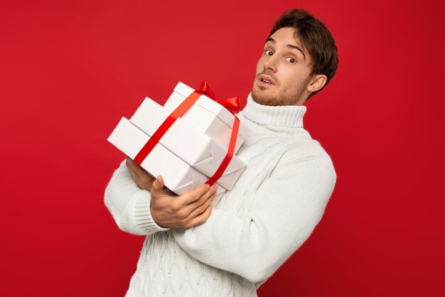 Close up on smiling man in knitted sweater isolated