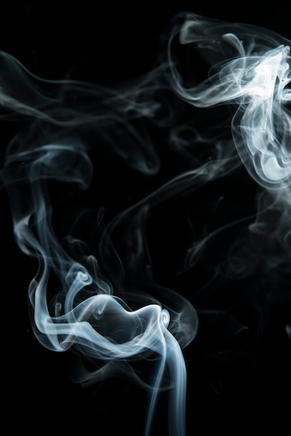 Close-up of smoke against black background