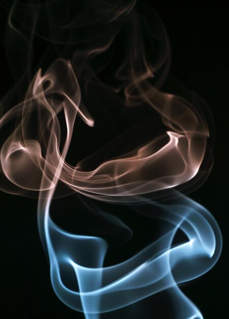 Photo close-up of smoke against black background