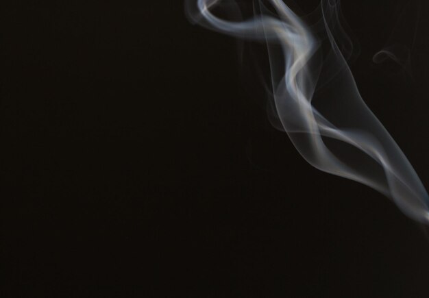 Close-up of smoke against black background