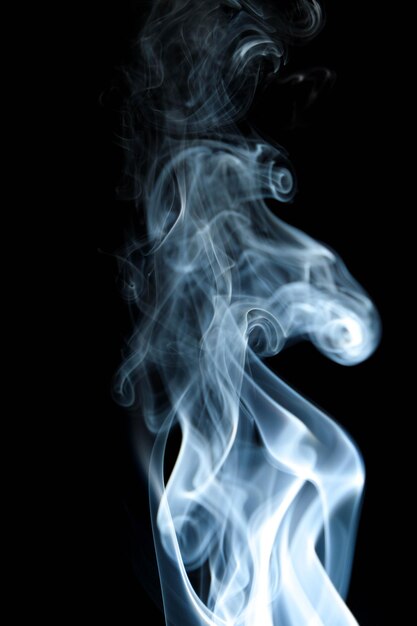 Photo close-up of smoke against black background