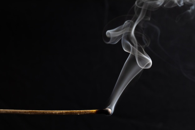 Close-up of smoke against black background