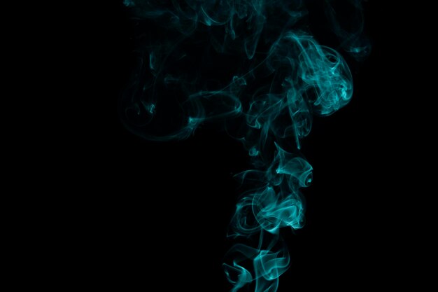 Photo close-up of smoke emitting from black background