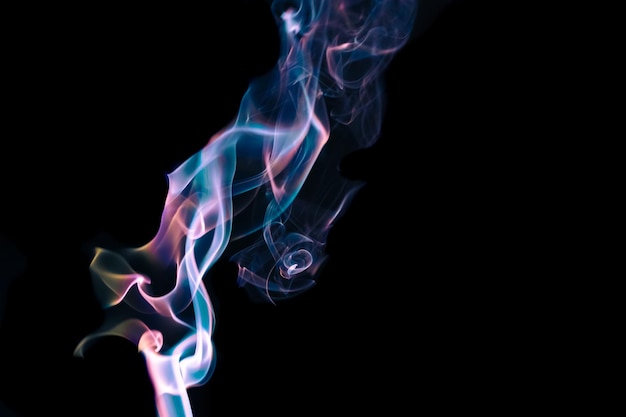 A close up of smoke with a black background