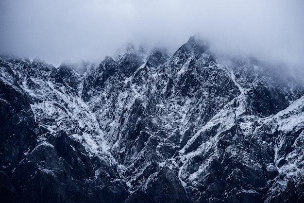 close-up of snow on mountain against sky
