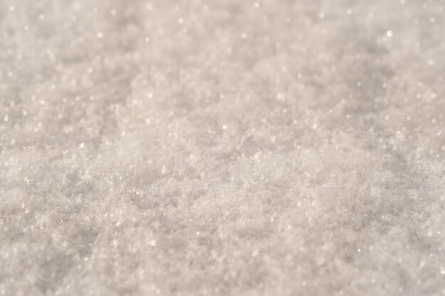 Photo close-up snow texture, snowflakes. winter snow wall