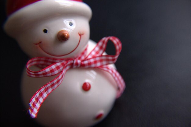 close-up of snowman figurine on table