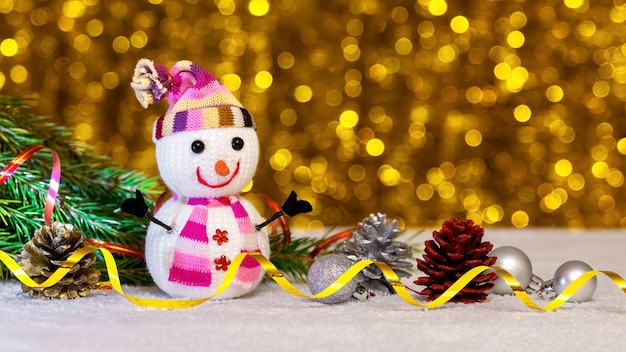 Close up on snowman toy and Christmas decorations