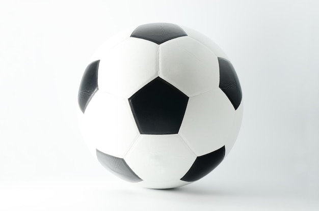 Close-up of soccer ball against white background