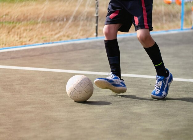 Close up of a soccer ball in the center of the stadium