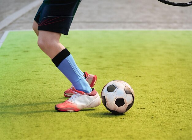 Close up of a soccer ball in the center of the stadium