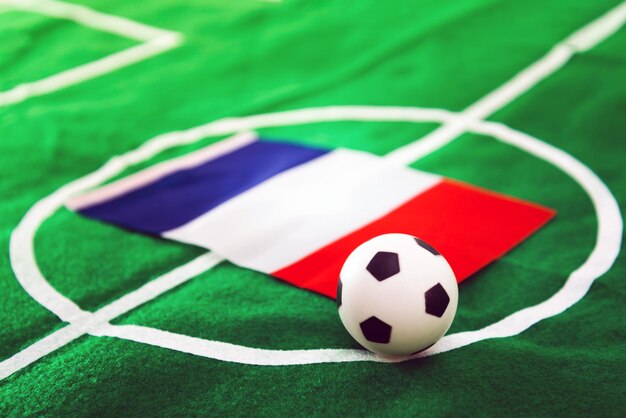 Close-up of soccer ball on flag