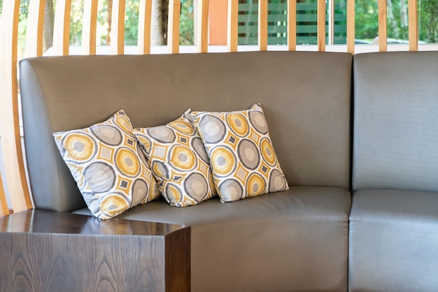 Photo close-up of sofa on table at home