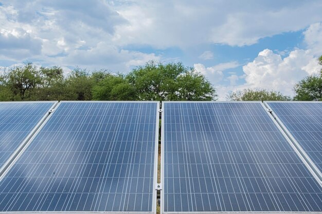 Close up of solar panels on a green landscape field