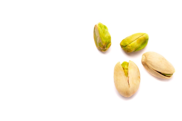 Close up on some pistachio nuts isolated