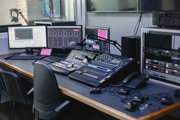 Close up of sound engineer studio with equipment