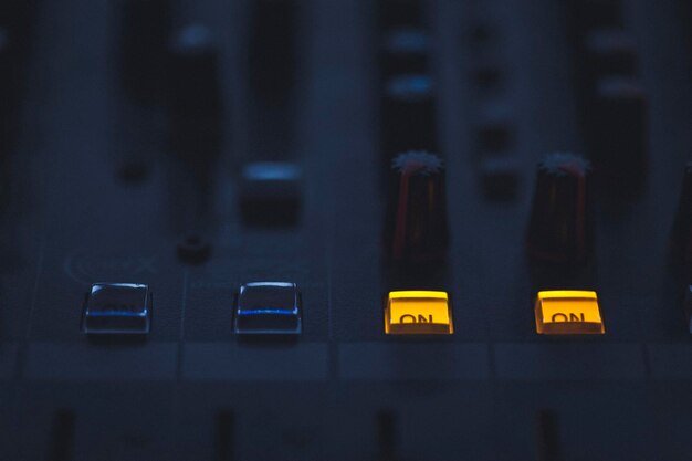 Photo close-up of sound mixer buttons