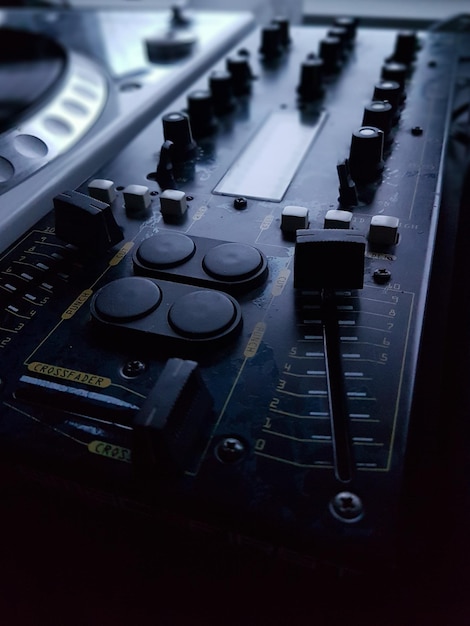 Photo close-up of sound mixer at studio