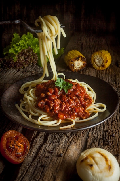 Close-up of spaghetti in plate on table