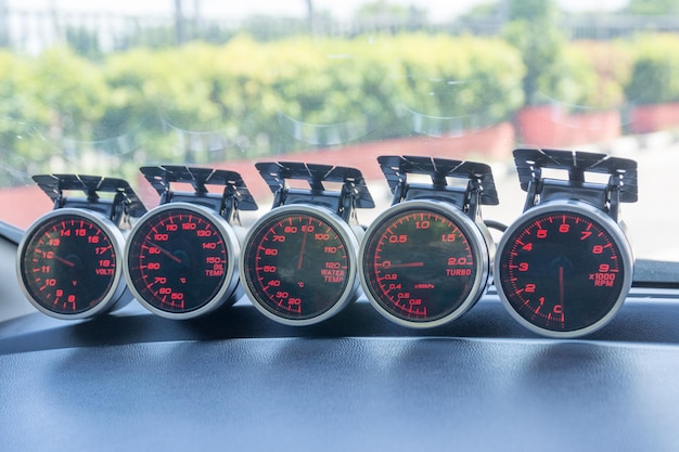 Close-up of speedometer on car windshield