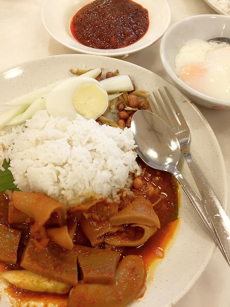 Close-up of spicy nasi lemak food in plate