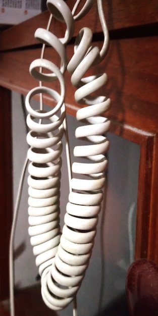 Photo close-up of spiral wire on table