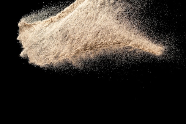 Photo close-up of splashing water against black background