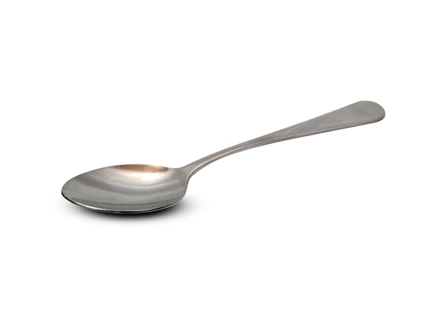 close-up of spoon against white background