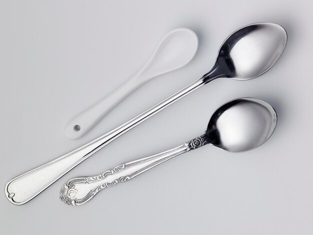 Close-up of spoon on white background