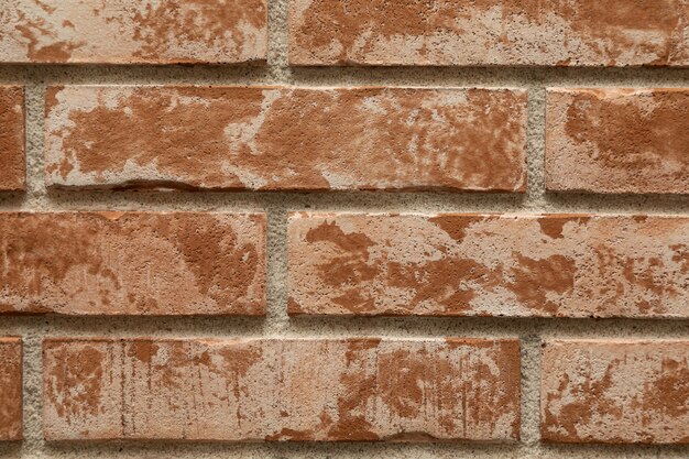 Close-up of spotty red and brown brick wall