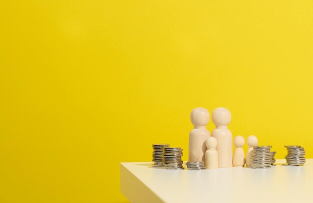 Close-up of a stack of colored pencils against yellow background