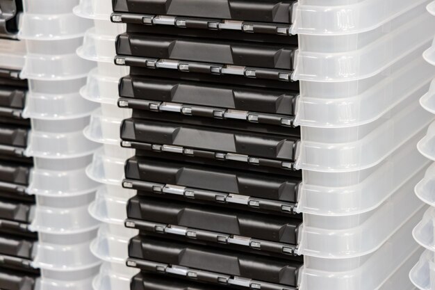 Photo close-up of stack of plastic containers