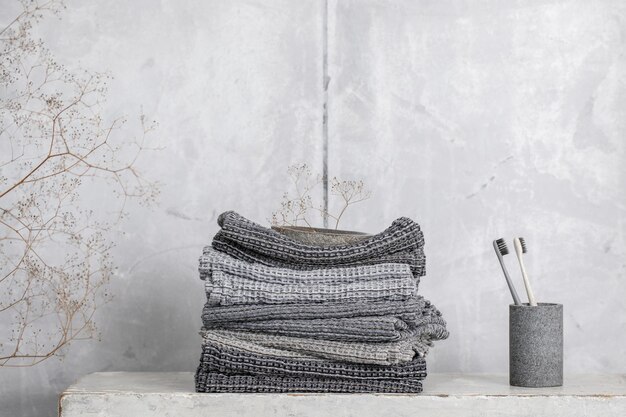 close-up of stack on table against wall