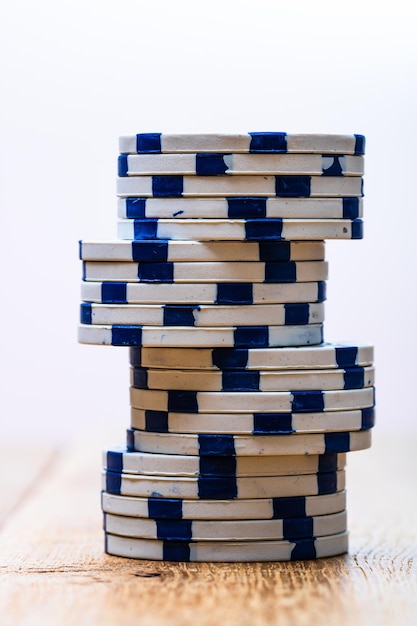 Photo close-up of stack of table against white background