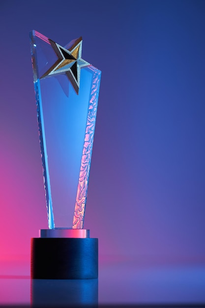 Photo close up of star shape crystal trophy