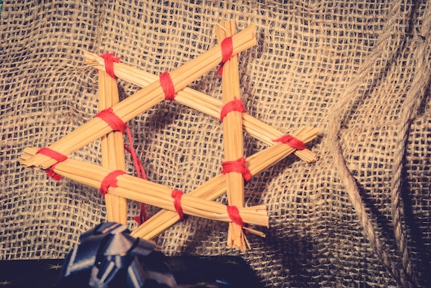 Close-up of star shape decoration on sack