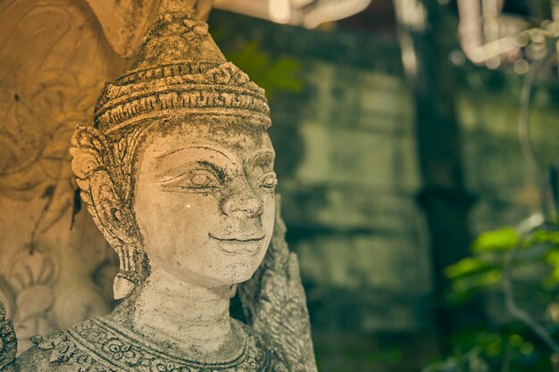 Close-up of statue against temple