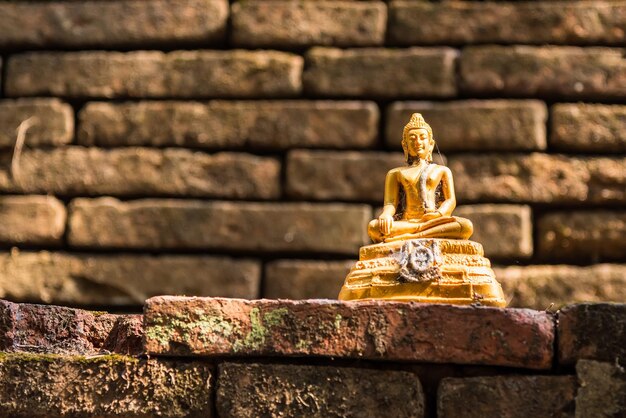 Photo close-up of statue against wall