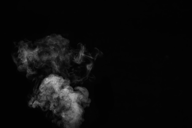 Premium Photo  Close up of steam smoke on black background. white hot  curly steam smoke isolated on black background, close-up. create mystical  halloween photos. abstract background, design element