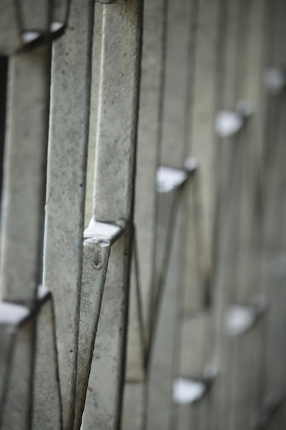 A close up of a steel structure with a white spot on the bottom.