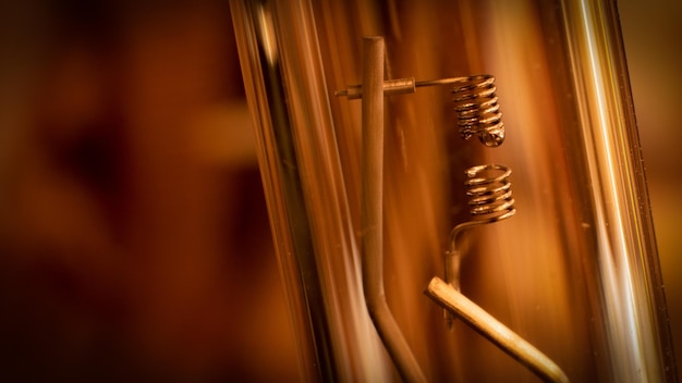 Photo close-up of sticks hanging on wall