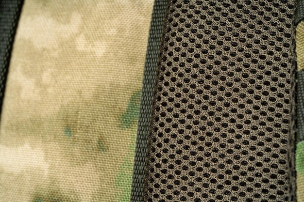 Close up still life of a green army tactical backpack