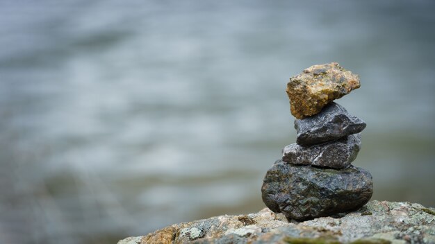 Close-up of a stone pyramid outdoors over the river